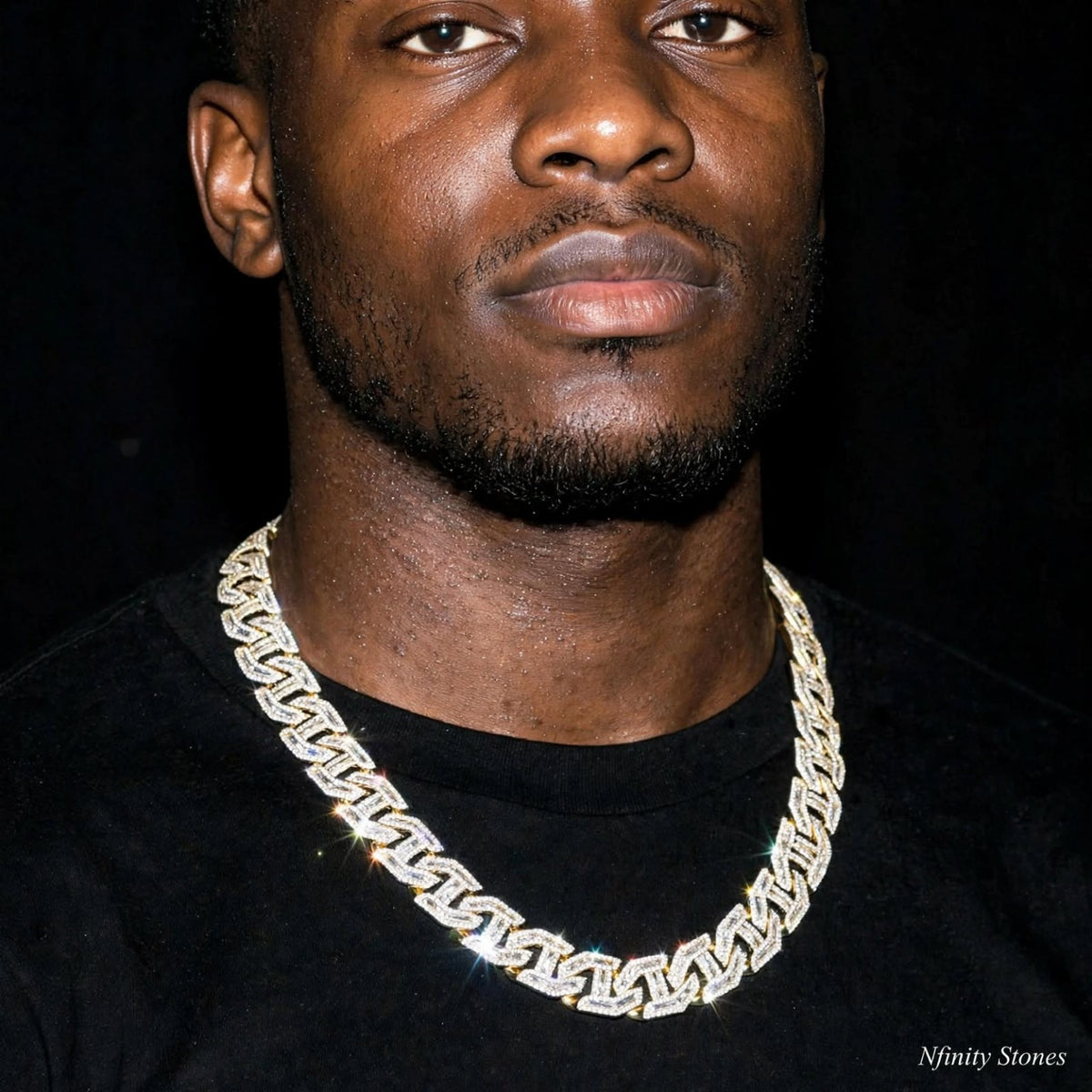 Model wearing the gold-tone Dynasty Link necklace against a black background