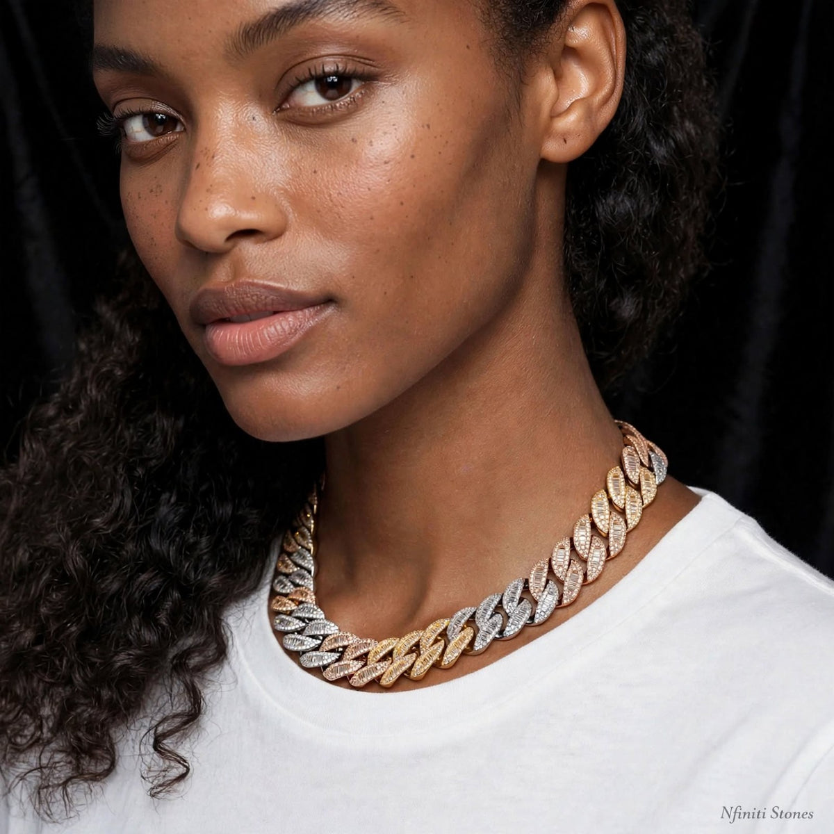 The Alliance mixed metal Cuban link worn by a model