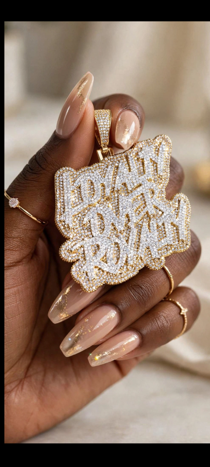 The Independence gold-tone Loyalty Over Royalty pendant