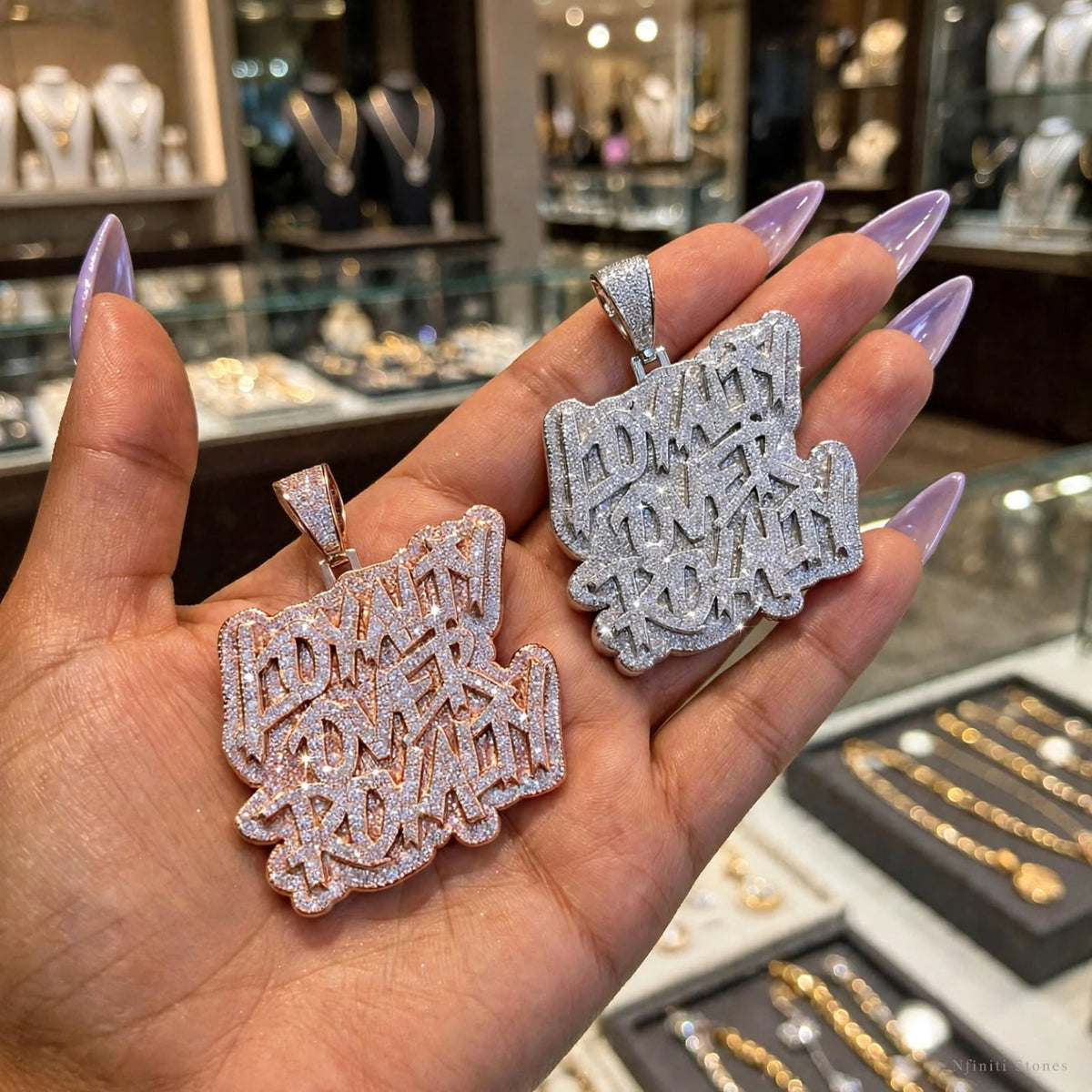 The Independence rose-gold-tone and silver-tone pendants