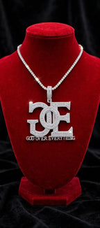 Silver color GOE pendant styled with a tennis chain