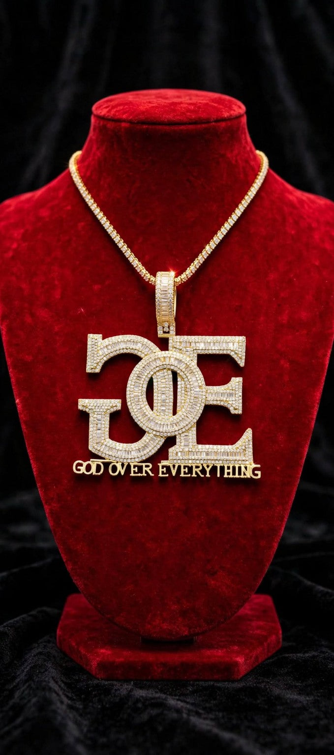 Gold color GOE pendant styled with a tennis chain