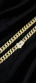 Gold Standard Cuban link chain and iced clasp