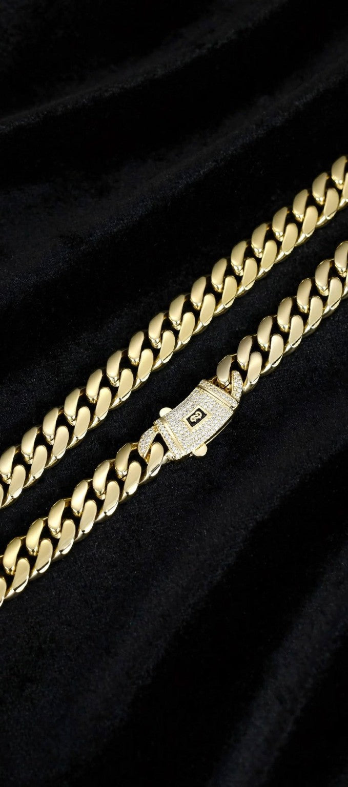 Gold Standard Cuban link chain and iced clasp