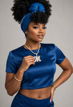 Model wearing iced M initial pendant