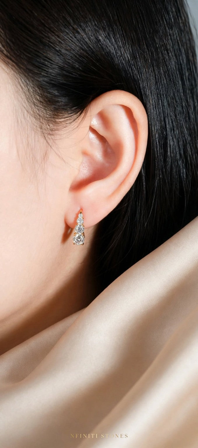 Graduated moissanite hoop earring lifestyle photo
