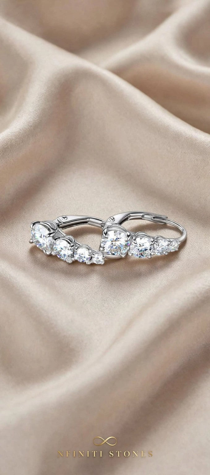 Graduated moissanite hoop earrings in silver-colored finish