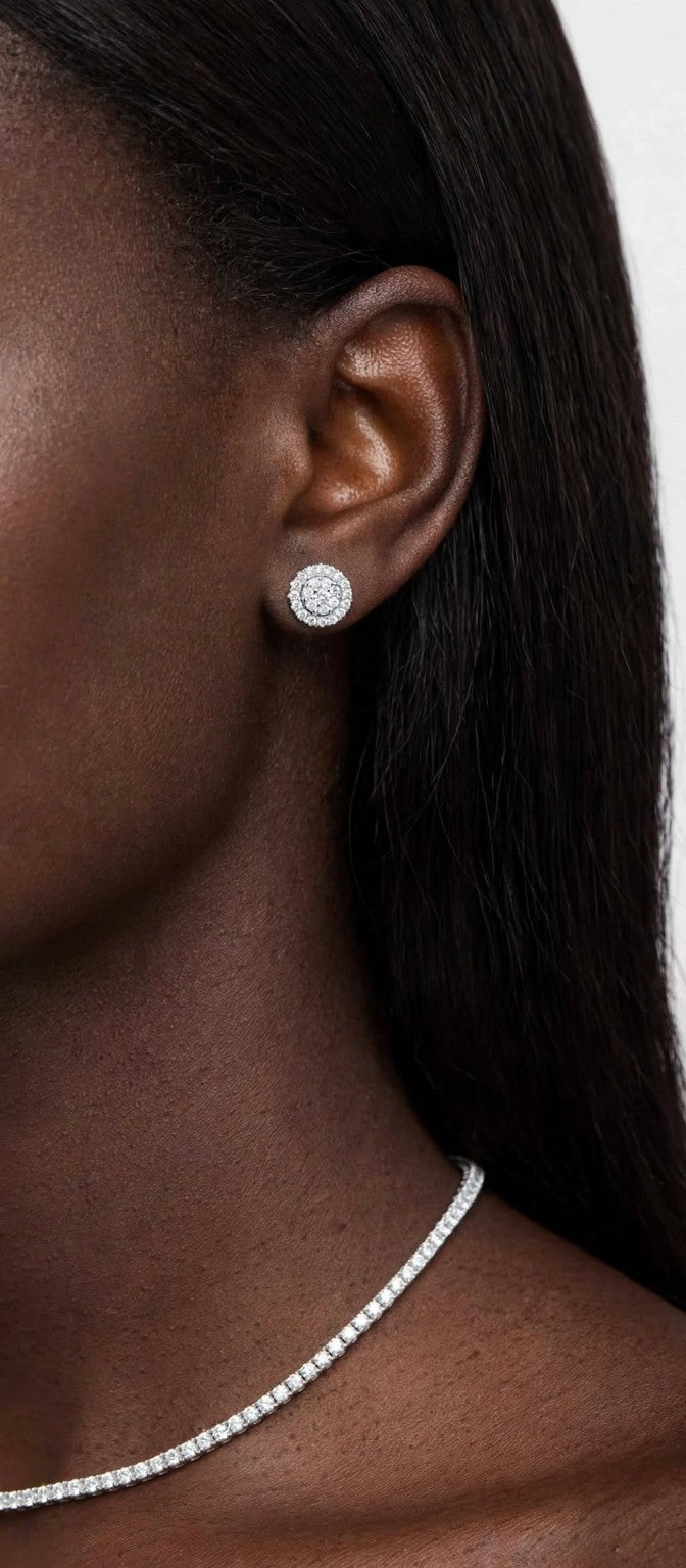 Model wearing round halo stud earrings; necklace shown separately