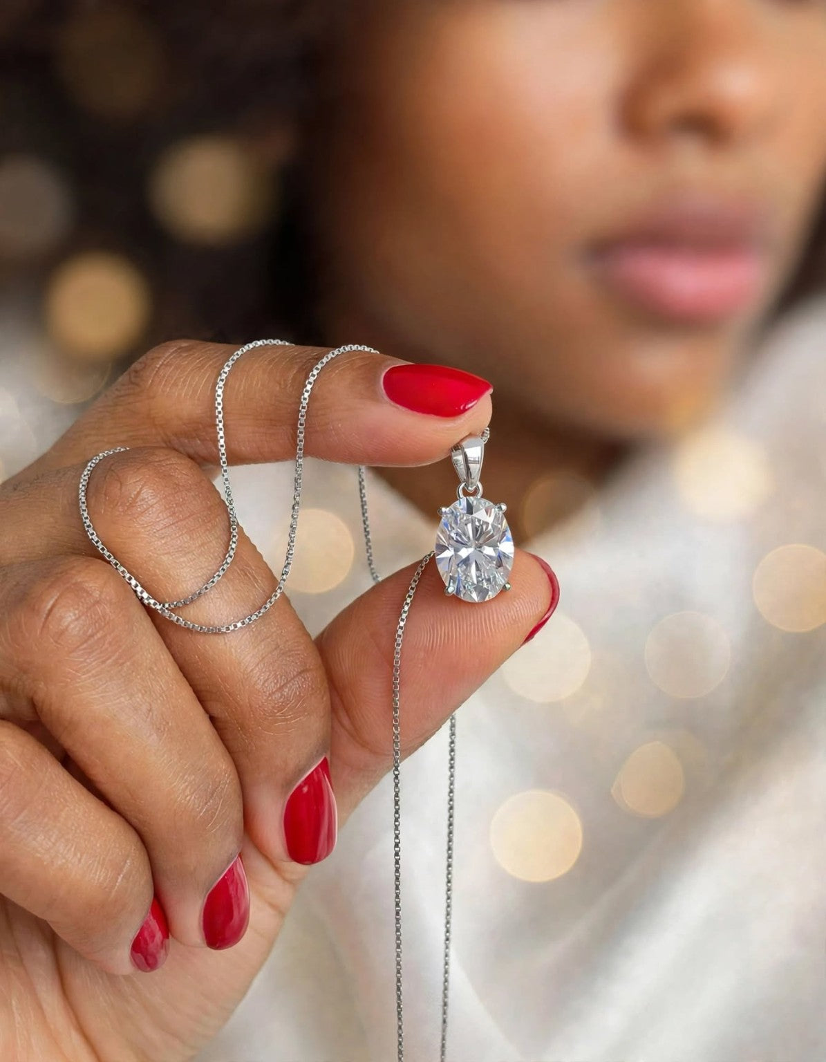 Oval moissanite pendant close-up