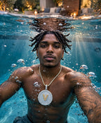 Custom iced-out disc pendant underwater lifestyle photograph