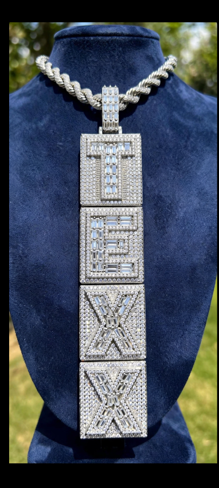 The Command Stack custom vertical letter pendant; Cuban chain shown for styling