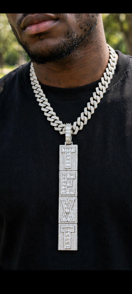 The Command Stack custom vertical letter pendant; Cuban chain shown for styling