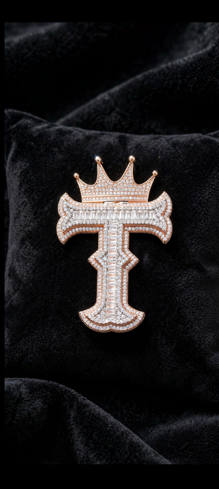 Rose gold crowned T initial pendant on black velvet