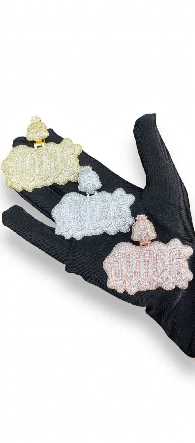 JUICE pendants in three finishes on black glove