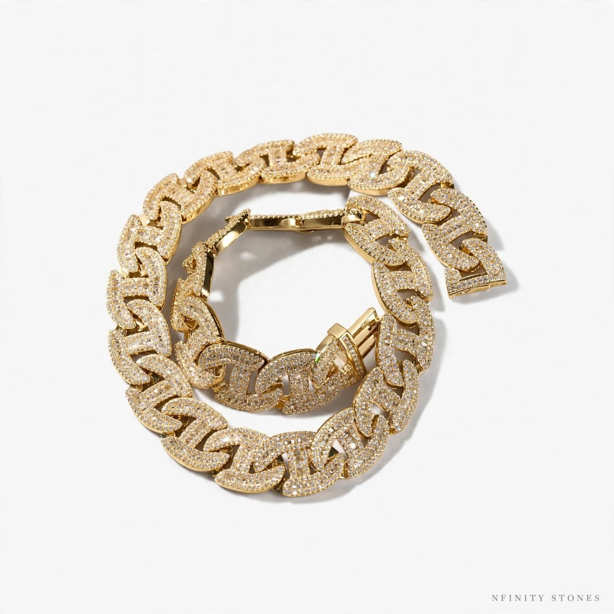 Gold-tone Dynasty Link chain and bracelet on white background
