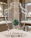 Green pendant on clear display stand