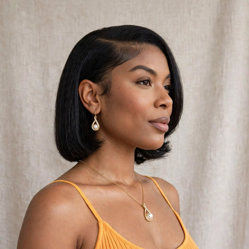 The Eternal Pearl gold-colored necklace and matching earrings worn together