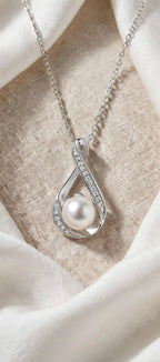 The Eternal Pearl silver-colored pendant detail