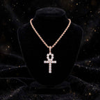 Rose gold ankh pendant on rope chain displayed on black bust