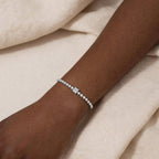 Heart cut bracelet against black background