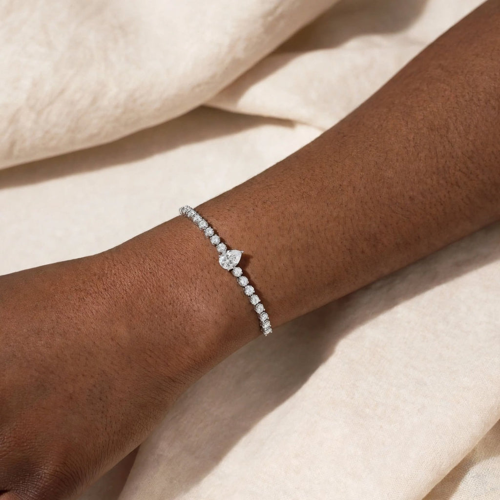 Pear cut Infinite Grace bracelet on wrist