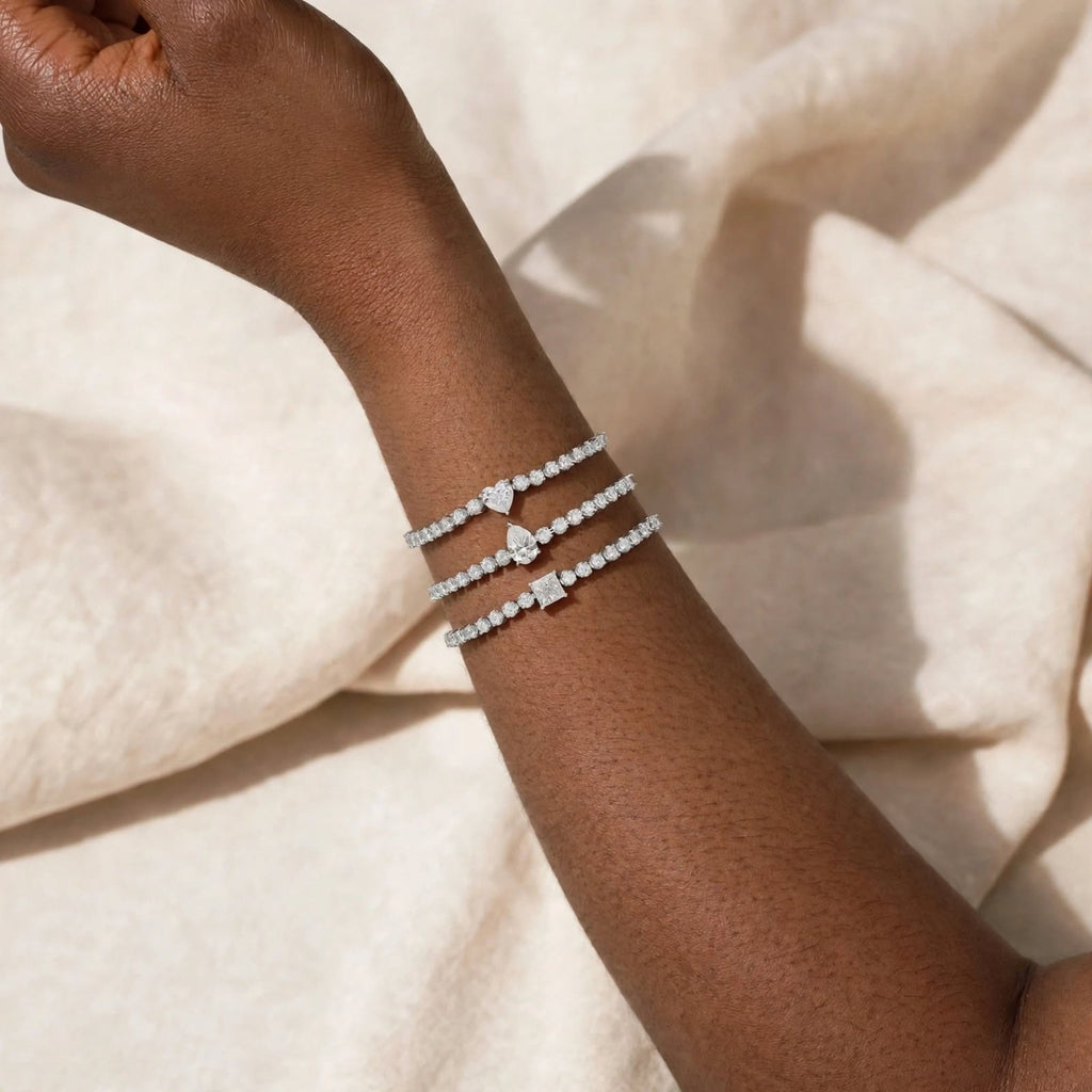 Heart, pear, and square Infinite Grace bracelet styles together