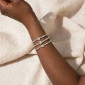 Heart, pear, and square Infinite Grace bracelet styles together