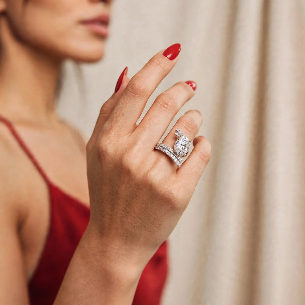 Model wearing 8CT oval moissanite ring