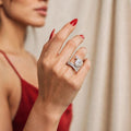 Model wearing 8CT oval moissanite ring
