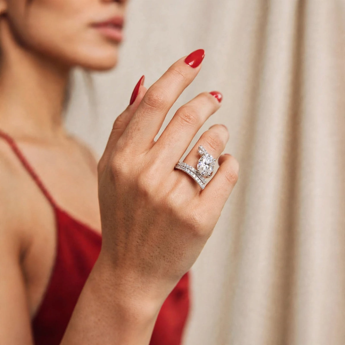Model wearing 8CT oval moissanite ring