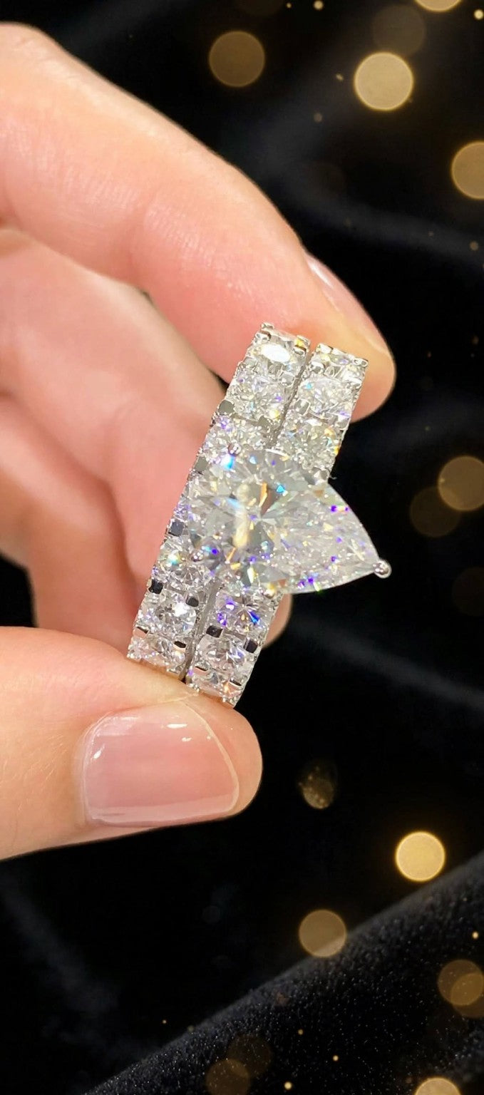 The Infinity Promise pear-cut moissanite bridal set