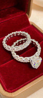 The Infinity Promise moissanite bridal set in a ring box