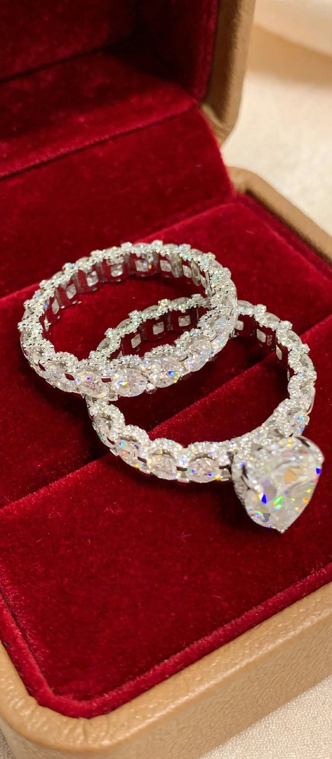 The Infinity Promise moissanite bridal set in a ring box