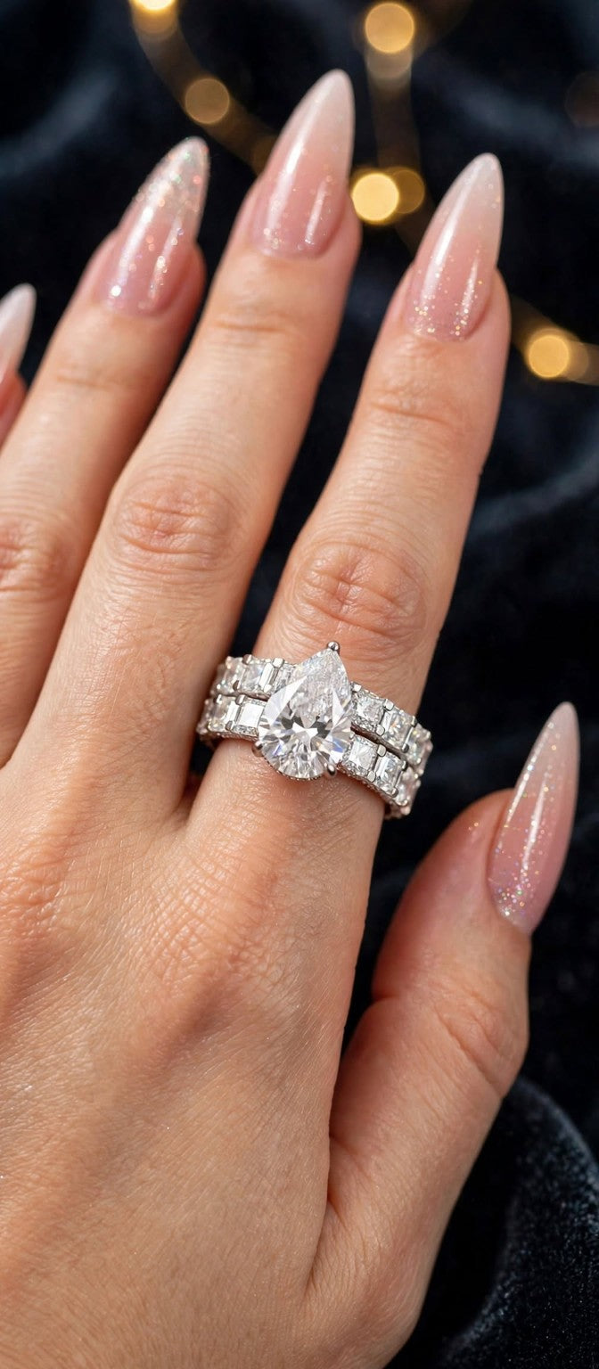 The Infinity Promise pear-cut moissanite bridal set