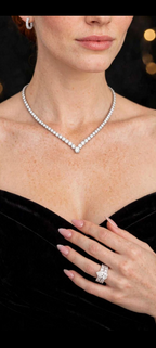 Model wearing The Infinity Promise moissanite bridal set