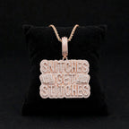 Rose-gold stacked pendant displayed on black velvet
