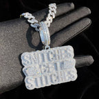 Silver iced-out stacked-letter pendant on black glove