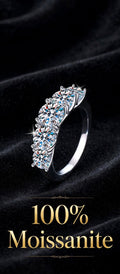 Nfiniti five-stone moissanite band on black velvet