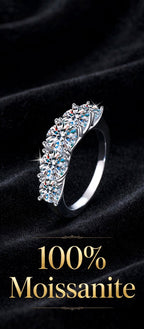 Nfiniti five-stone moissanite band on black velvet