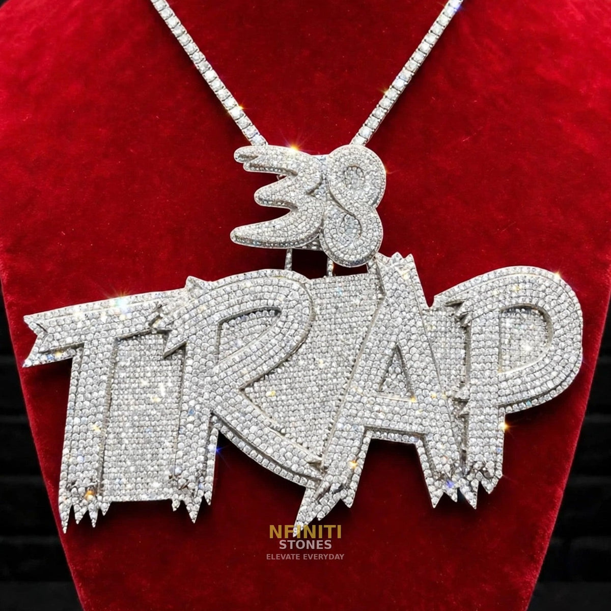 TRAP custom iced pendant detail with Nfiniti Stones branding