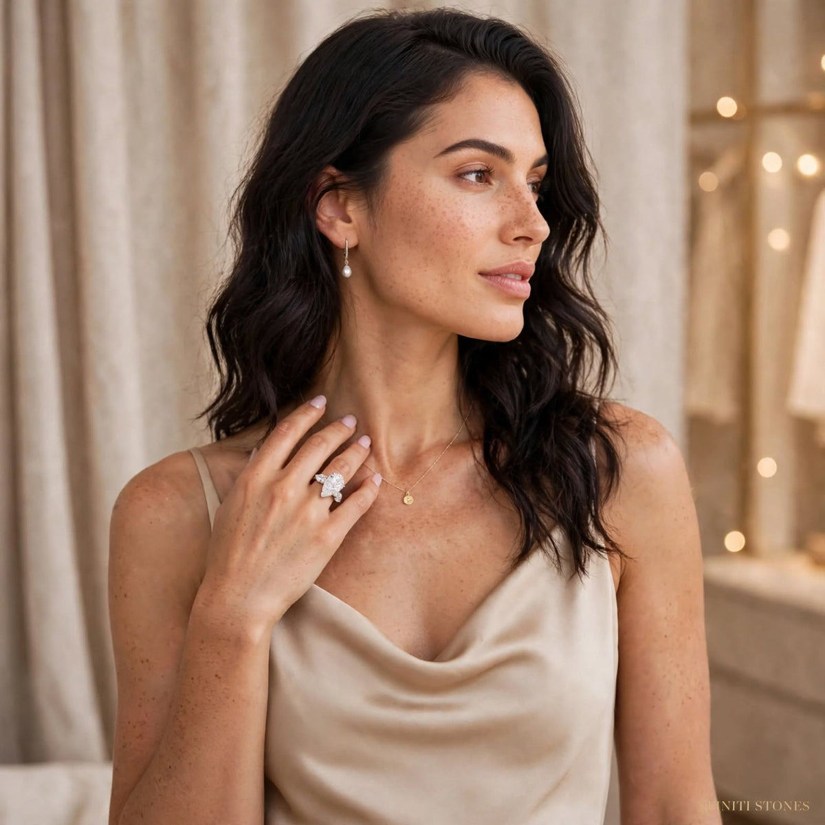Model wearing The Duchess pear-cut moissanite ring