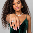Model in green dress displaying The Duchess ring