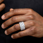Three-row eternity ring worn on hand