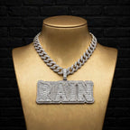 RAIN custom pendant on gold display bust, front view