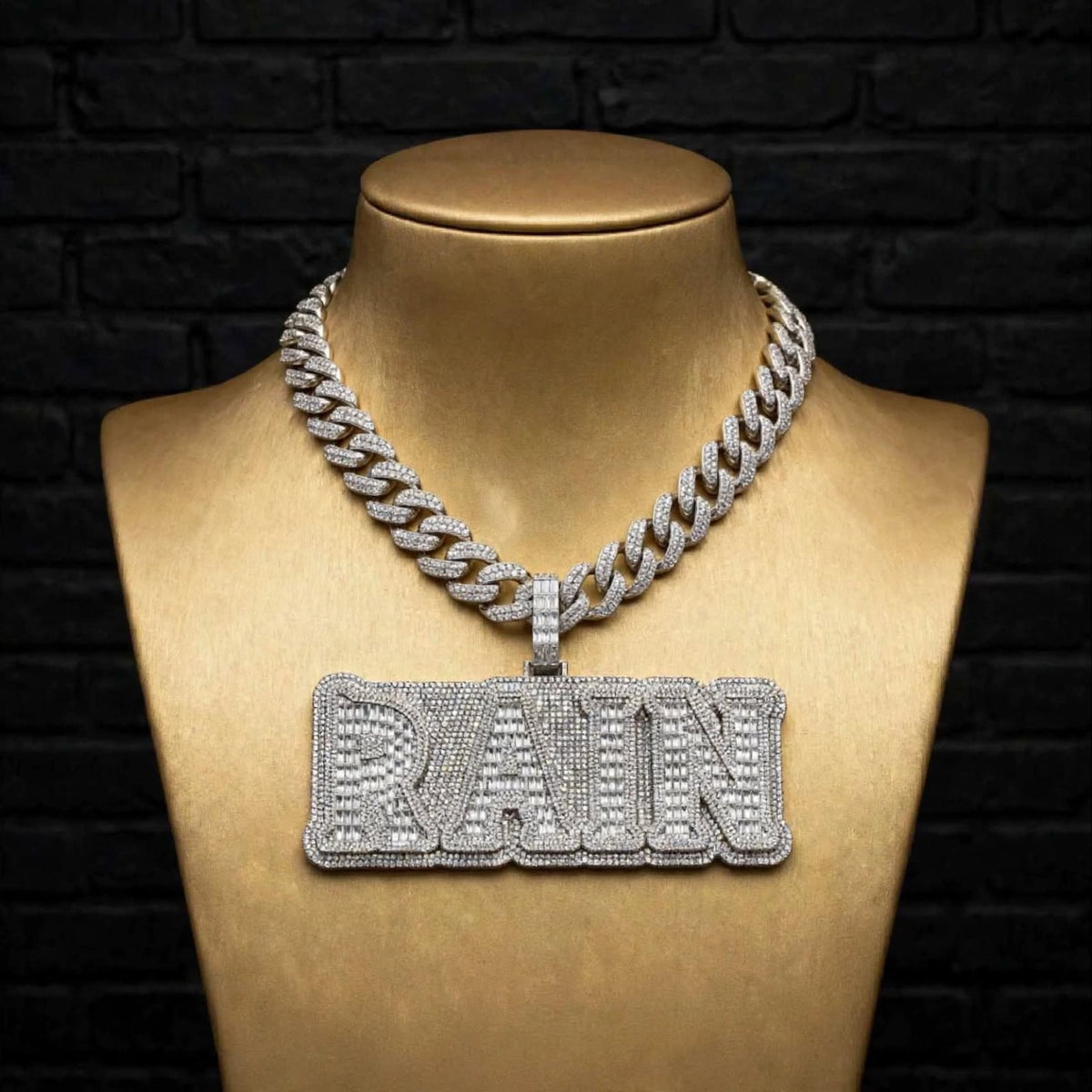 RAIN custom pendant on gold display bust, front view