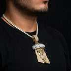 Gold Jesus floral-crown pendant worn on model from alternate angle