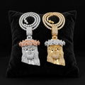 Silver and gold Jesus head pendants with iced floral crowns on black velvet
