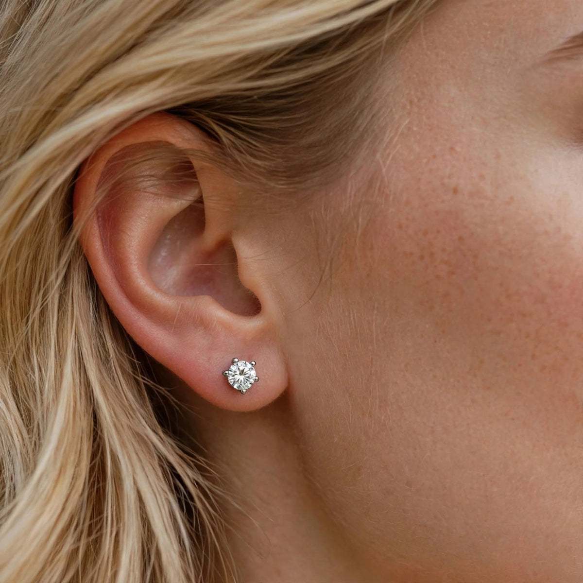 Nfiniti Signature Studs — moissanite earrings in sterling silver