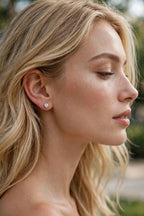 Nfiniti Signature Studs — moissanite earrings in sterling silver