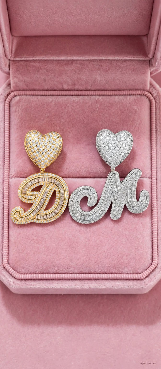 Gold D and silver M pendants in pink velvet box